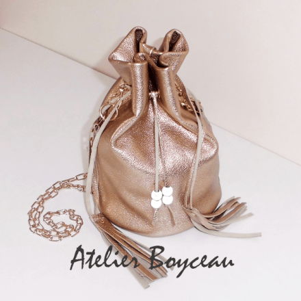 Handmade gold leather pouch with gold chain strap